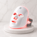 Auveni LED red light therapy face mask, front view, white background